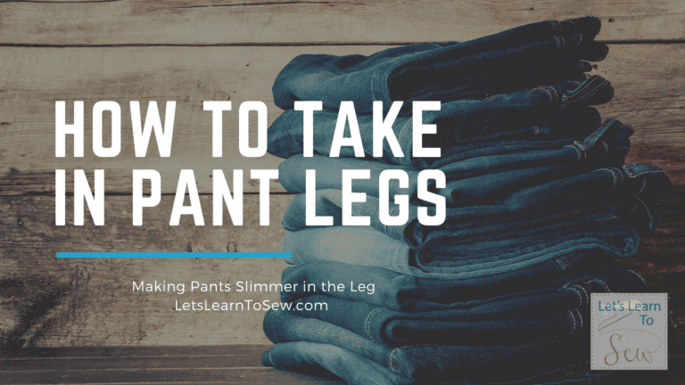 stack of blue jeans ready to be sewn